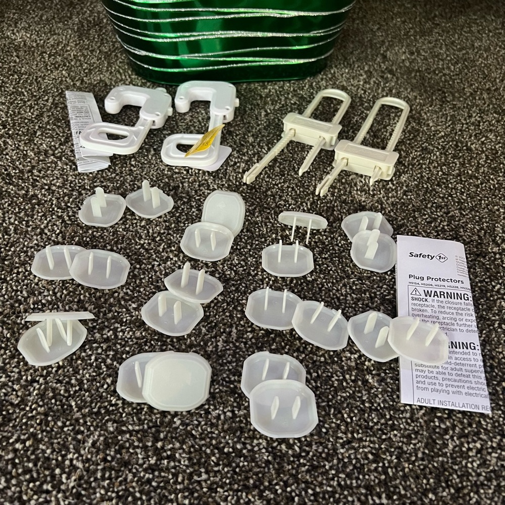 Child Safety cabinet fasteners and child safety electrical plug in protectors.